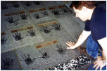 Outside 'the Guitar Centre' in Los Angeles, trying his hand in Donald Fagen's print!